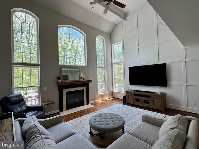 10609 Little Run Farm Ct, Vienna, VA 22182 - living room featuring a ceiling fan, healthy amount of natural light, a high end fireplace, wood finished floors, and high vaulted ceiling
