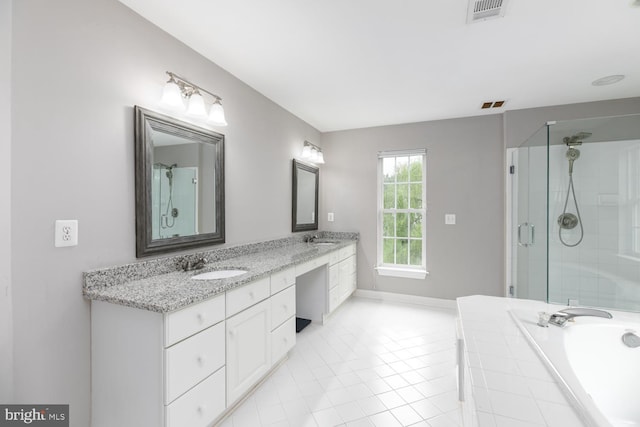 10609 Little Run Farm Ct, Vienna, VA 22182 - full bathroom featuring a stall shower, a garden tub, double vanity, tile patterned floors, and baseboards