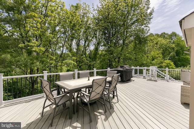 10609 Little Run Farm Ct, Vienna, VA 22182 - wooden terrace featuring outdoor dining area, area for grilling, and view of wooded area