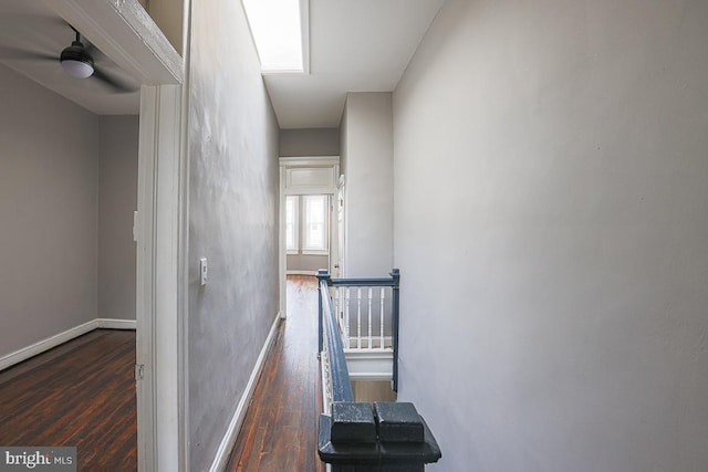 2014 Penrose Ave, Baltimore, MD 21223 - hall with dark wood finished floors, baseboards, and an upstairs landing