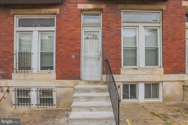 2014 Penrose Ave, Baltimore, MD 21223 - property entrance featuring brick siding