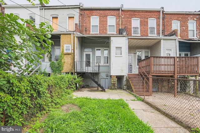 2014 Penrose Ave, Baltimore, MD 21223 - back of property with stairs and brick siding