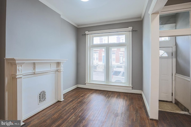 2014 Penrose Ave, Baltimore, MD 21223 - unfurnished living room with dark wood-style flooring, crown molding, and baseboards