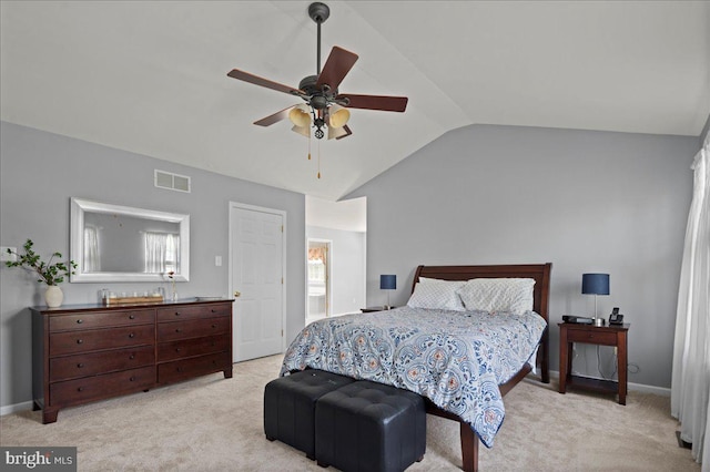 bedroom featuring carpet, vaulted ceiling, baseboards, and a ceiling fan