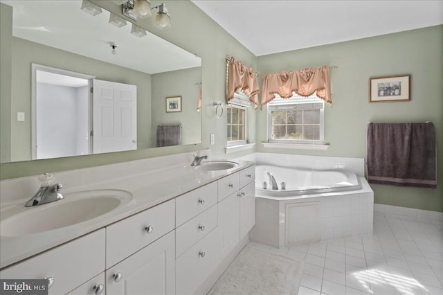 full bath featuring tile patterned flooring, a bath, and double vanity