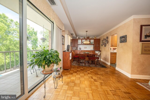 1655 Oakwood Dr Unit N323, Narberth, PA 19072 - dining area with baseboards, plenty of natural light, and ornamental molding