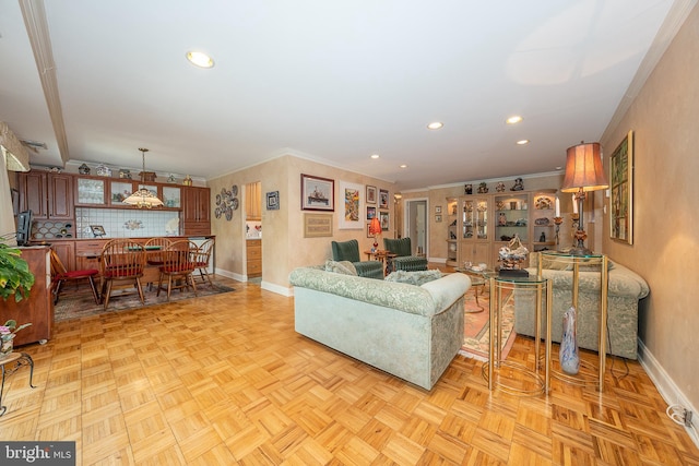 1655 Oakwood Dr Unit N323, Narberth, PA 19072 - living room featuring baseboards, crown molding, and recessed lighting