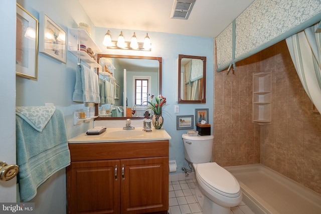 1655 Oakwood Dr Unit N323, Narberth, PA 19072 - full bathroom featuring toilet, tile patterned flooring, vanity, and tiled shower