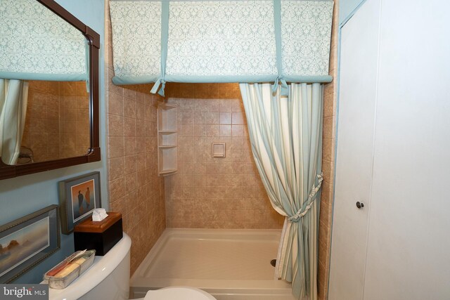 1655 Oakwood Dr Unit N323, Narberth, PA 19072 - full bathroom featuring toilet and a tile shower