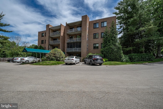 1655 Oakwood Dr Unit N323, Narberth, PA 19072 - view of apartment building / complex featuring uncovered parking
