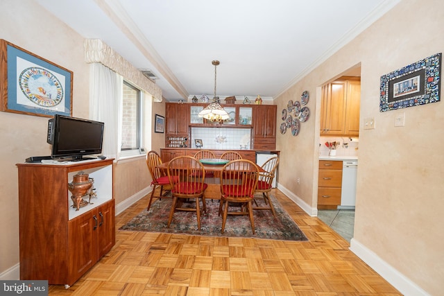 1655 Oakwood Dr Unit N323, Narberth, PA 19072 - dining space featuring a chandelier, baseboards, and ornamental molding