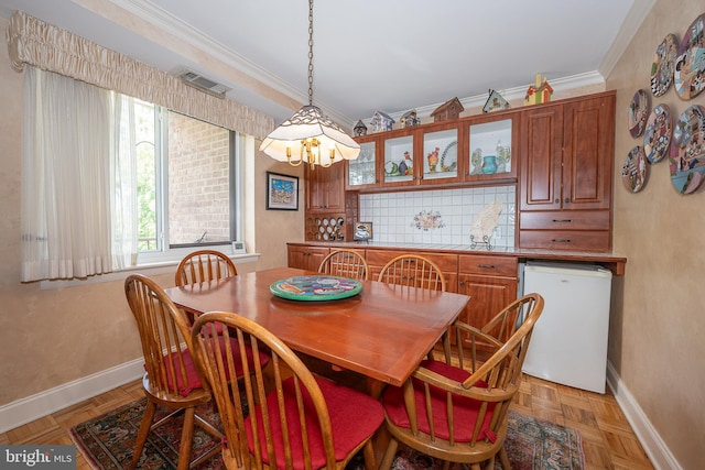 1655 Oakwood Dr Unit N323, Narberth, PA 19072 - dining space featuring baseboards, a chandelier, and crown molding