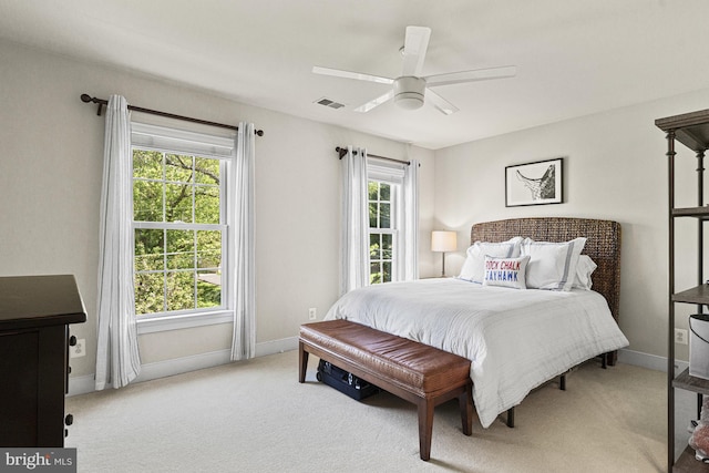 bedroom featuring carpet flooring, baseboards, and ceiling fan