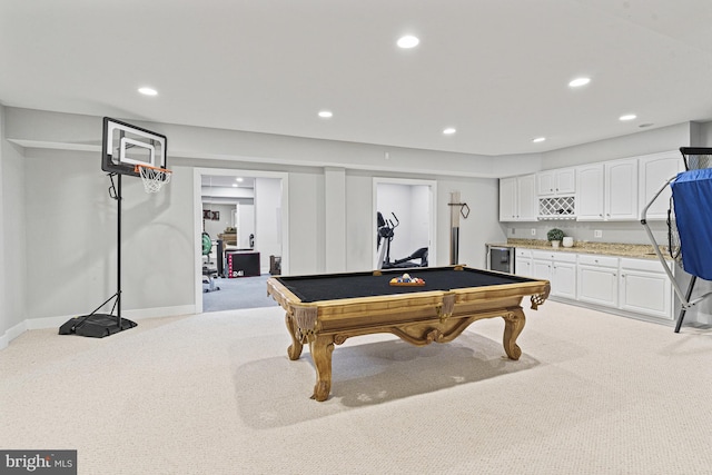 recreation room with light carpet, bar with sink, recessed lighting, billiards, and baseboards