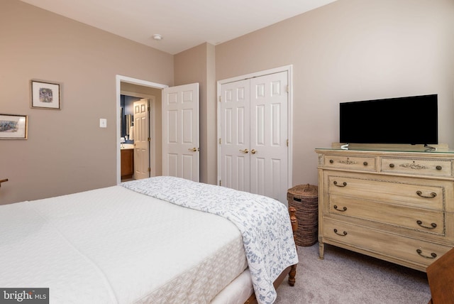 carpeted bedroom featuring a closet