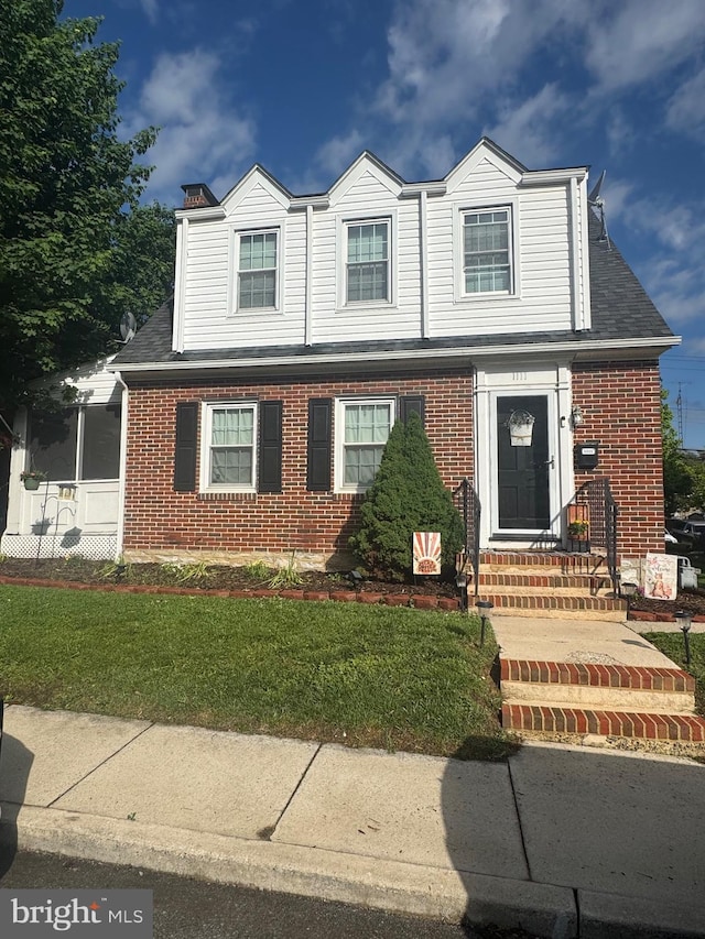 1111 Fry Ave, Hagerstown, MD 21742 - view of front of property featuring brick siding and a front yard