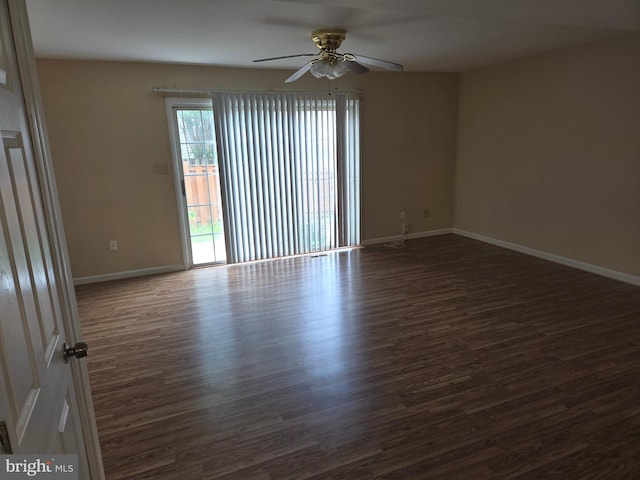 1850 Aberdeen Cir, Crofton, MD 21114 - spare room featuring ceiling fan, dark wood-style floors, and baseboards