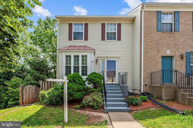 10541 Brechin Way, Manassas, VA 20109 - view of front of house featuring fence and brick siding