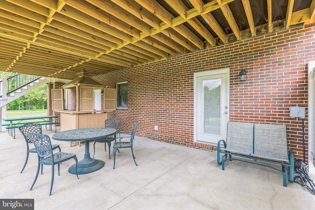 7290 Southern Maryland Blvd, Owings, MD 20736 - view of patio with stairs and outdoor dining space