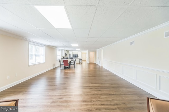 7290 Southern Maryland Blvd, Owings, MD 20736 - workout area featuring crown molding, wood finished floors, and a wainscoted wall
