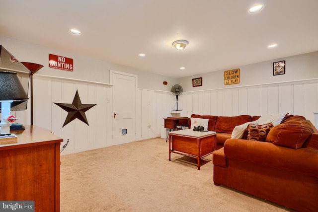 409 Academy Rd, Baltimore, MD 21228 - living room featuring light carpet, wainscoting, recessed lighting, and a decorative wall