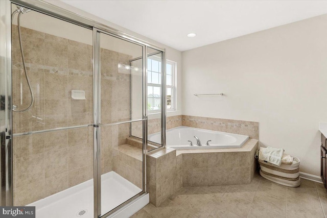 13324 John Martin Dr, Williamsport, MD 21795 - full bath with a shower stall, tile patterned flooring, and a bath