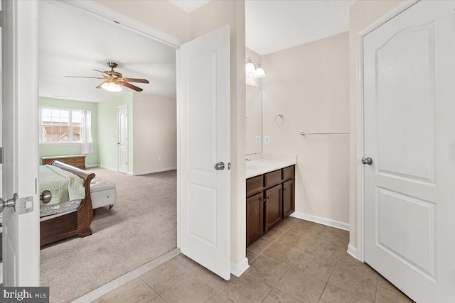 13324 John Martin Dr, Williamsport, MD 21795 - bathroom with baseboards, tile patterned flooring, vanity, and a ceiling fan