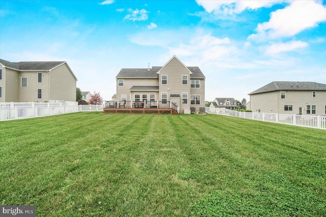 13324 John Martin Dr, Williamsport, MD 21795 - rear view of house with a yard, a wooden deck, and a fenced backyard