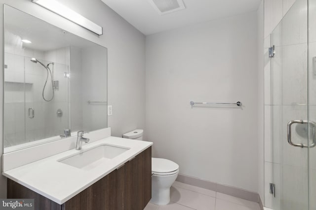 full bath with toilet, a shower stall, vanity, tile patterned floors, and baseboards