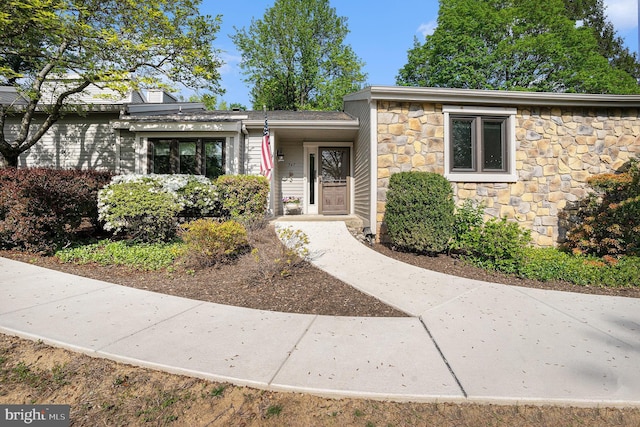 view of front facade featuring stone siding