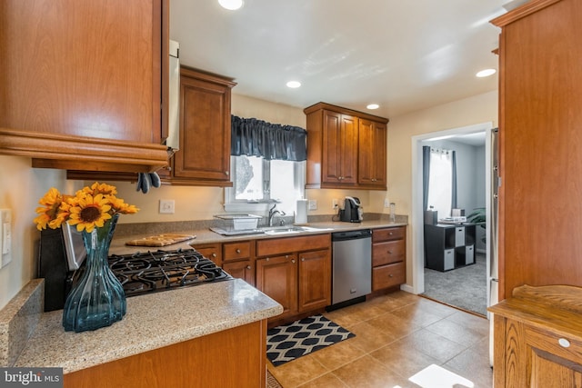 22 N Browning Ave, Somerdale, NJ 08083 - kitchen featuring stainless steel dishwasher, a sink, brown cabinetry, recessed lighting, and light tile patterned floors