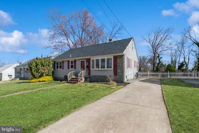 22 N Browning Ave, Somerdale, NJ 08083 - view of front of property with concrete driveway, a shingled roof, and a chimney