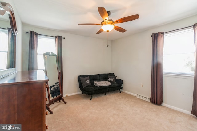 22 N Browning Ave, Somerdale, NJ 08083 - living area featuring a ceiling fan, healthy amount of natural light, and light carpet