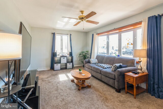 22 N Browning Ave, Somerdale, NJ 08083 - carpeted living area featuring a ceiling fan and baseboards