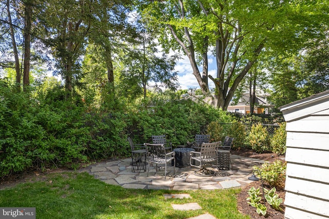 view of yard featuring a patio area and fence
