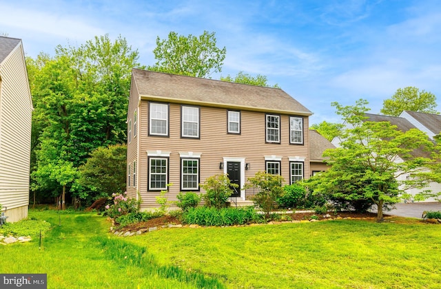 907 5th Unit B, Delaware City, DE 19706 - colonial-style house with roof with shingles and a front yard