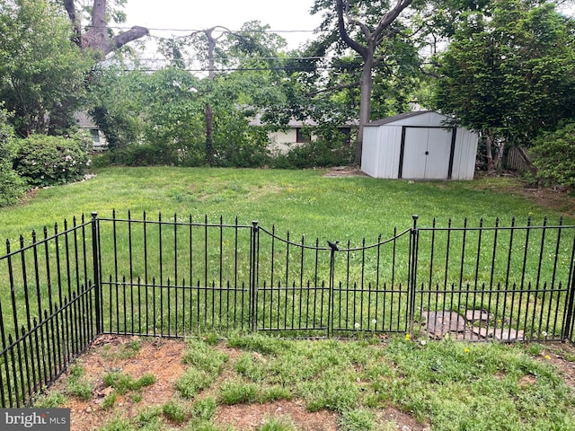 view of yard featuring a storage shed and an outdoor structure