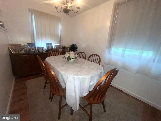 dining area featuring a chandelier