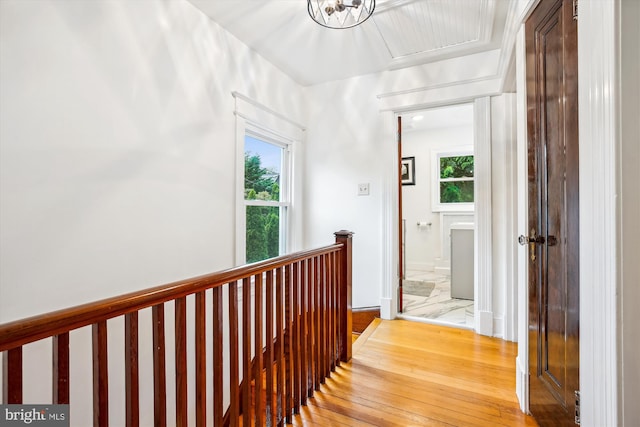 4311 Ellicott St NW, Washington, DC 20016 - hallway with an upstairs landing, wood finished floors, and baseboards