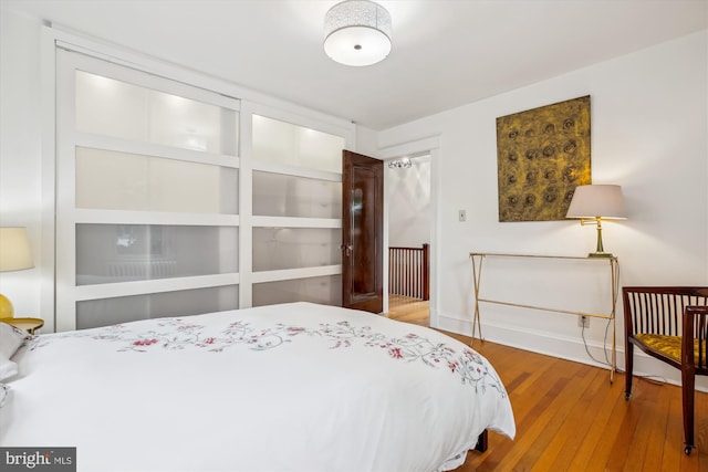 4311 Ellicott St NW, Washington, DC 20016 - bedroom with hardwood / wood-style floors and baseboards