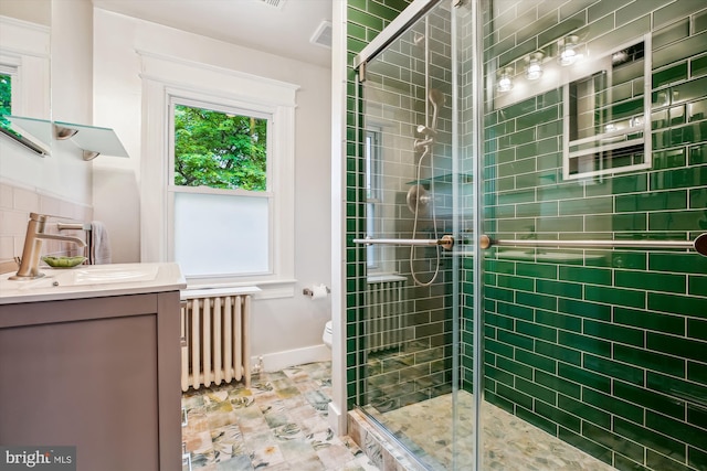 4311 Ellicott St NW, Washington, DC 20016 - full bathroom with radiator heating unit, a stall shower, toilet, and vanity