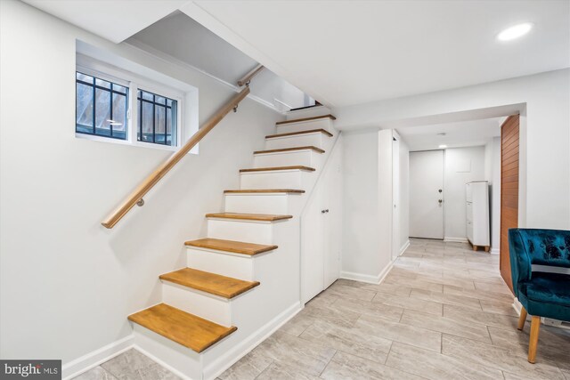 4311 Ellicott St NW, Washington, DC 20016 - staircase with baseboards and recessed lighting