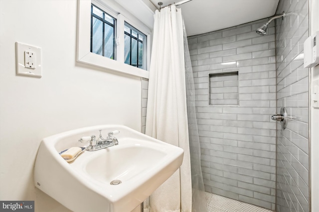 4311 Ellicott St NW, Washington, DC 20016 - bathroom featuring a sink and a tile shower