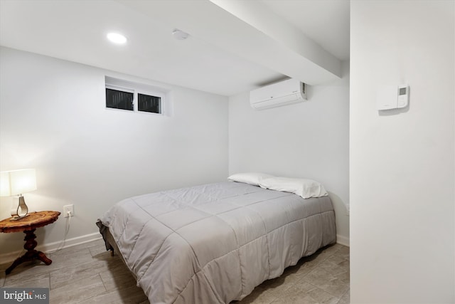 4311 Ellicott St NW, Washington, DC 20016 - bedroom featuring a wall mounted air conditioner, baseboards, and recessed lighting