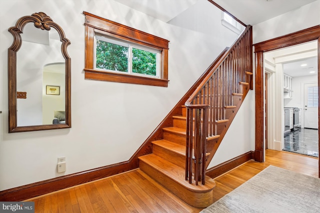 4311 Ellicott St NW, Washington, DC 20016 - stairs with hardwood / wood-style floors and baseboards