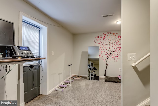 misc room with baseboards, carpet flooring, and an office area