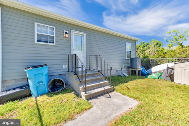 rear view of property featuring cooling unit