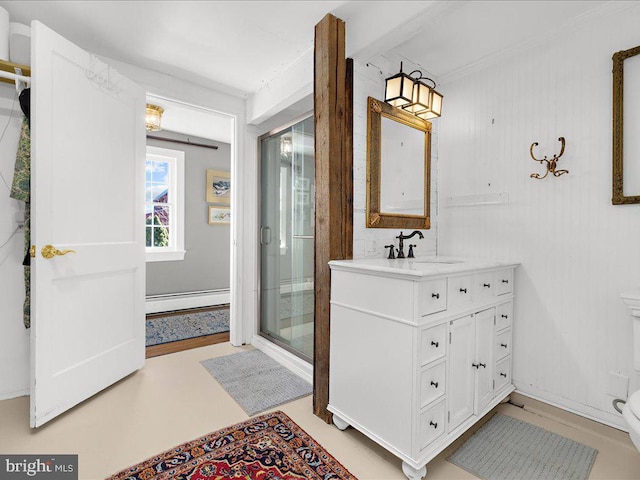 full bath with a baseboard heating unit, toilet, vanity, and a shower stall