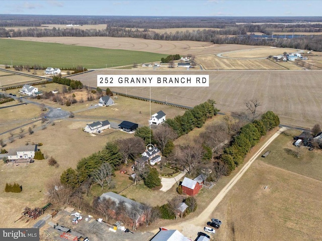 aerial view of property and surrounding area with rural landscape