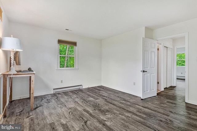 22 Hillside Ct, Huntingtown, MD 20639 - unfurnished room featuring a baseboard radiator, wood finished floors, baseboards, and baseboard heating